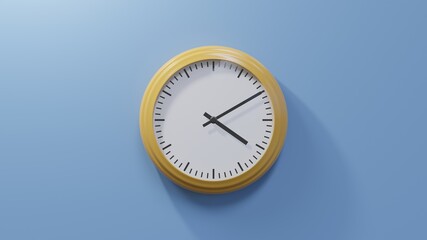 Glossy orange clock on a blue wall at ten past four. Time is 04:10 or 16:10