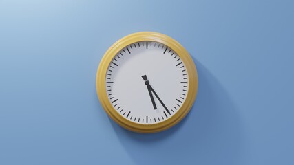 Glossy orange clock on a blue wall at twenty-four past five. Time is 05:24 or 17:24