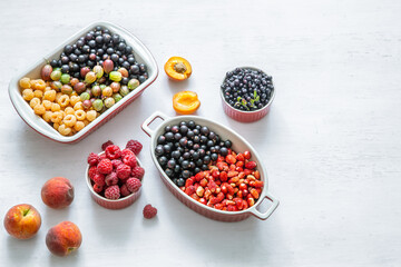 Composition with a variety of fresh berries and fruits