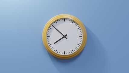 Glossy orange clock on a blue wall at fifty-two past seven. Time is 07:52 or 19:52