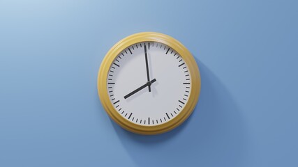 Glossy orange clock on a blue wall at fifty-nine past seven. Time is 07:59 or 19:59