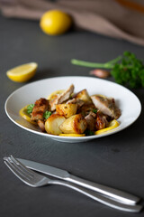 Greek Style Roasted Chicken, Potatoes, Parsely and Lemon