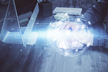 Social network theme hologram with businessman working on computer on background. Concept of world wide web. Multi exposure.