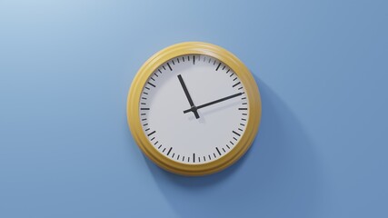 Glossy orange clock on a blue wall at twelve past eleven. Time is 11:12 or 23:12