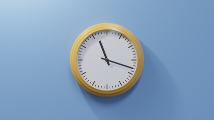 Glossy orange clock on a blue wall at eighteen past eleven. Time is 11:18 or 23:18