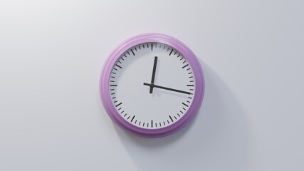 Glossy pink clock on a white wall at seventeen past twelve. Time is 00:17 or 12:17