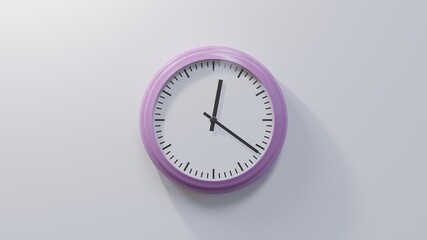 Glossy pink clock on a white wall at twenty-one past twelve. Time is 00:21 or 12:21