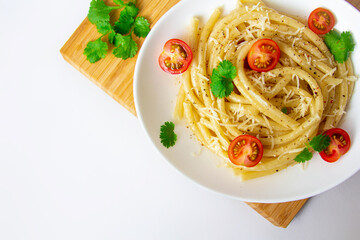 Spaghetti with cherry tomatoes and cheese copyspace