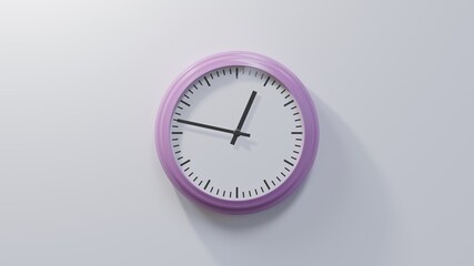 Glossy pink clock on a white wall at forty-seven past twelve. Time is 00:47 or 12:47