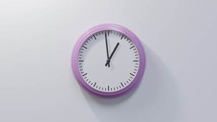 Glossy pink clock on a white wall at fifty-nine past twelve. Time is 00:59 or 12:59