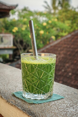 Glass of green smoothie