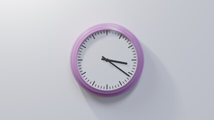 Glossy pink clock on a white wall at twenty-one past three. Time is 03:21 or 15:21