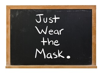 Just wear the mask period written in white chalk on a black chalkboard isolated on white