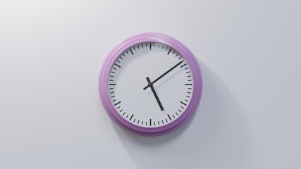 Glossy pink clock on a white wall at nine past five. Time is 05:09 or 17:09