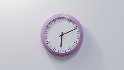 Glossy pink clock on a white wall at eleven past six. Time is 06:11 or 18:11