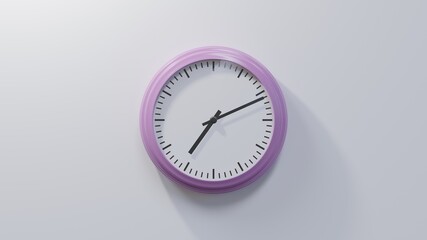 Glossy pink clock on a white wall at eleven past seven. Time is 07:11 or 19:11