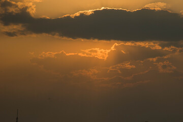 The sun at sunset and, slightly covering it, clouds (option 9)