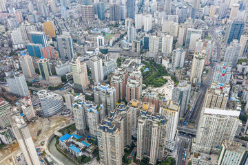 Fototapeta na wymiar Aerial view of modern city and mountains