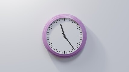 Glossy pink clock on a white wall at twenty-four past eleven. Time is 11:24 or 23:24