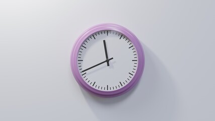 Glossy pink clock on a white wall at forty-one past eleven. Time is 11:41 or 23:41