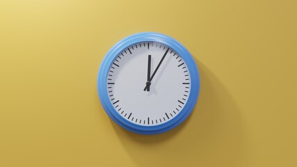 Glossy blue clock on a orange wall at five past twelve. Time is 00:05 or 12:05
