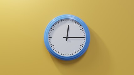 Glossy blue clock on a orange wall at quarter past twelve. Time is 00:15 or 12:15