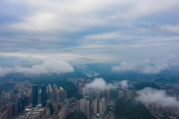 Aerial view of modern city and mountains