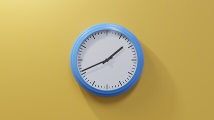 Glossy blue clock on a orange wall at forty-one past one. Time is 01:41 or 13:41