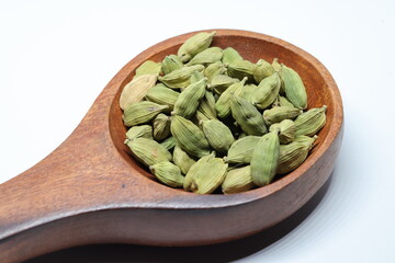 Green Dried cardamom seeds isolated on white background