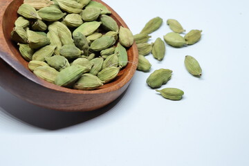 Green Dried cardamom seeds isolated on white background