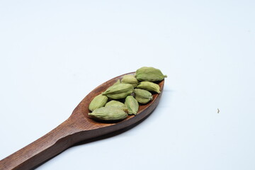 Green Dried cardamom seeds isolated on white background