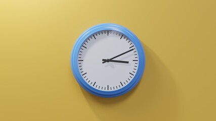 Glossy blue clock on a orange wall at eleven past three. Time is 03:11 or 15:11