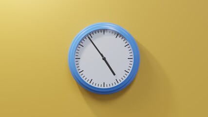 Glossy blue clock on a orange wall at fifty-four past four. Time is 04:54 or 16:54