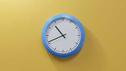 Glossy blue clock on a orange wall at forty-one past ten. Time is 10:41 or 22:41