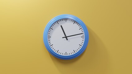 Glossy blue clock on a orange wall at thirteen past eleven. Time is 11:13 or 23:13