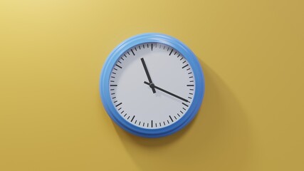 Glossy blue clock on a orange wall at nineteen past eleven. Time is 11:19 or 23:19