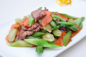 Close up view of Hong Kong and Cantonese style cuisine Chinese kale fried beef 