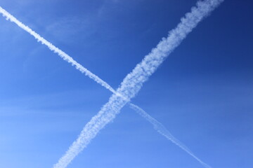 Cross of clouds in the sky. Russia.