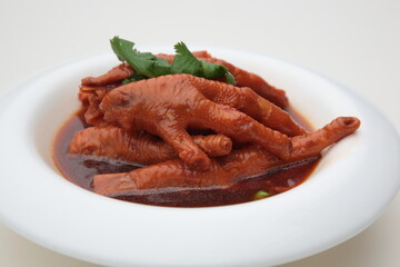 Close up view of  typical Chinese cuisine Abalone Sauce Chicken Claw