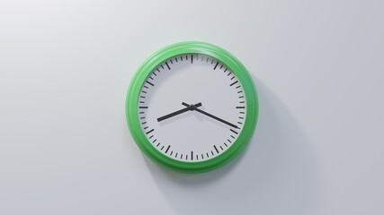 Glossy green clock on a white wall at nineteen past eight. Time is 08:19 or 20:19