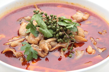 Close up of  Chinese Sichuan province style Cuisine Spring water frog fried in spicy pepper hot soup 