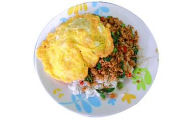 Pad Ka-prao; stir fried chopped chicken with chili and basil, served with steamed rice and fried egg on top set on white backgroud