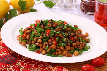 Close up of  a typical Chinese Sichuan province cuisine Fried pork with chili and preserved vegetable