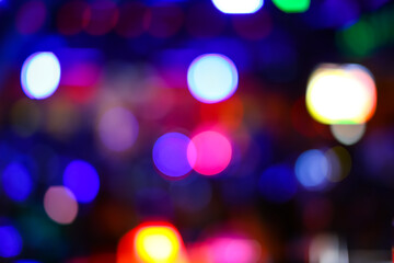 BLURRED AND BOKEH OF LIGHTS AND CHANDELIERS IN LUXURY BAR