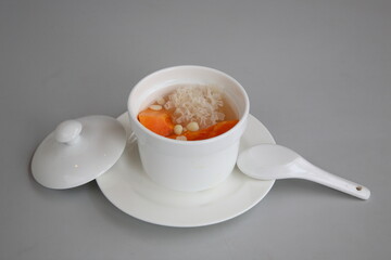 Close up of Chinese popular dessert Stewed papaya with white fungus