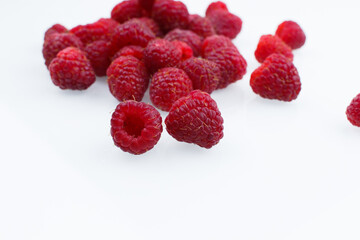 raspberries on white background