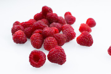 raspberries on white background