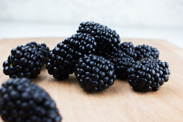 blackberries on a white background macro photo