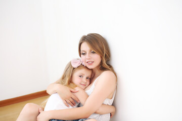 Fototapeta na wymiar Emotions. Happy loving family. Mother and daughter spend time together at home.