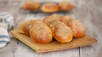 Homemade yeast buns with crumble. Sweet bread.